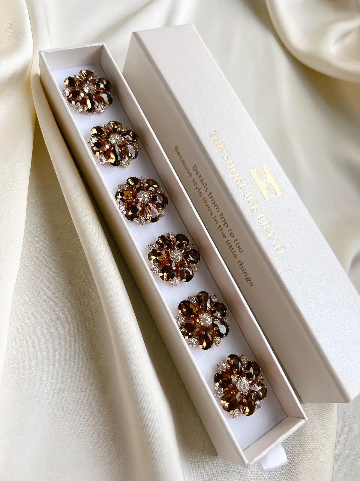 The Shoelace Brand- Erika – Brown & White Flower Button Charm Gold